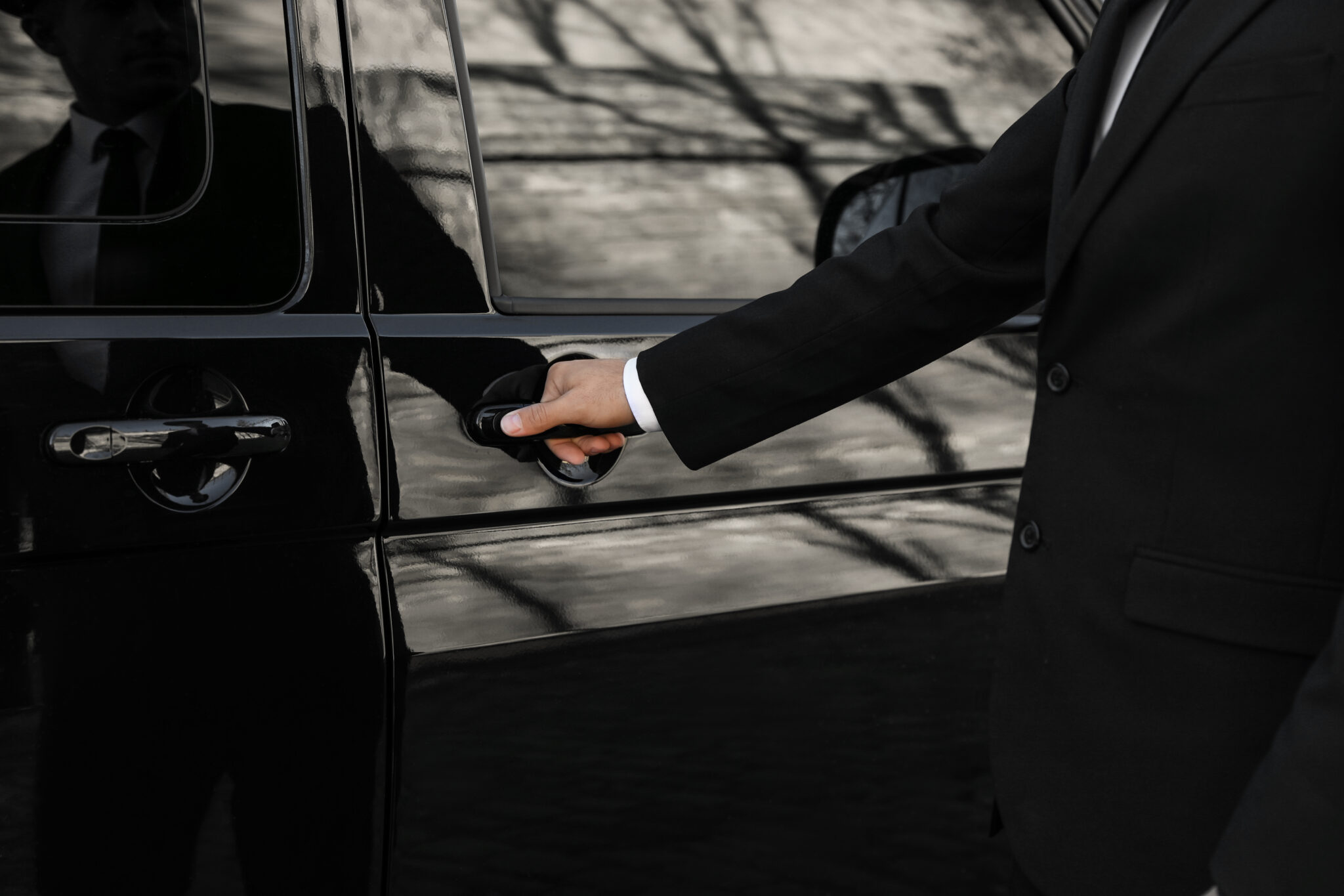 Driver,Opening,Door,Of,Luxury,Car,,Closeup.,Chauffeur,Service